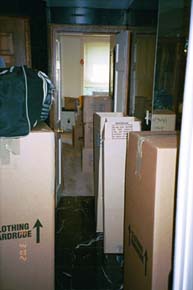 A view through the hallway into the bedroom